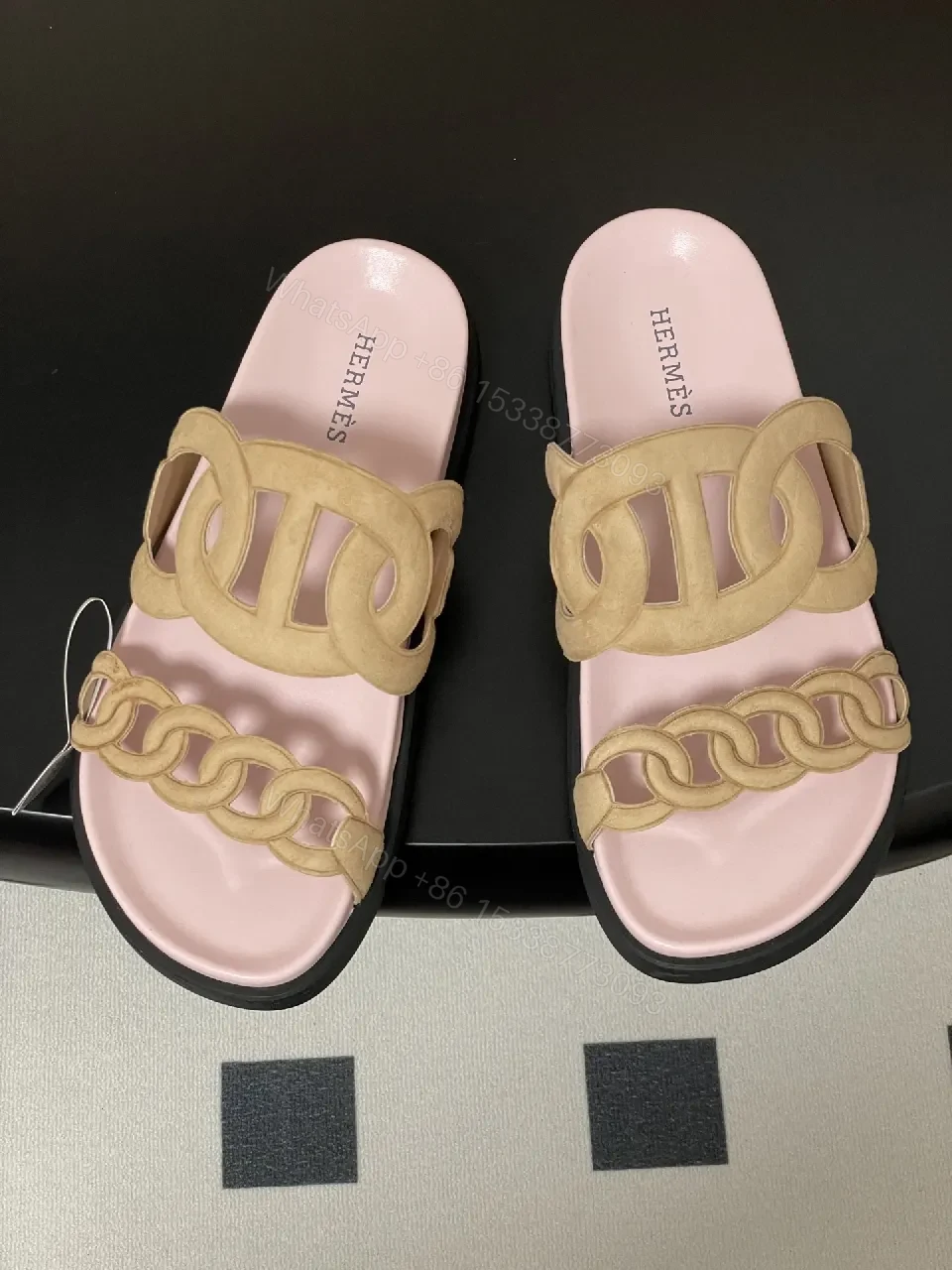 View 2 of Soft Pink Leather Slides with Signature Interlaced Straps
