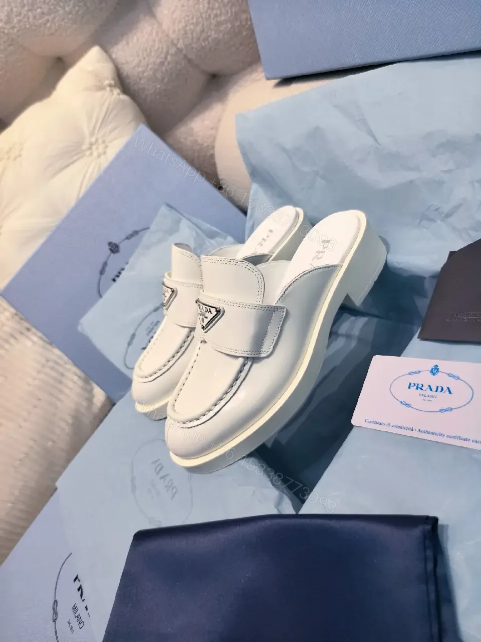 View 6 of White Leather Prada Slip-ons: Classic Padded Comfort Shoes