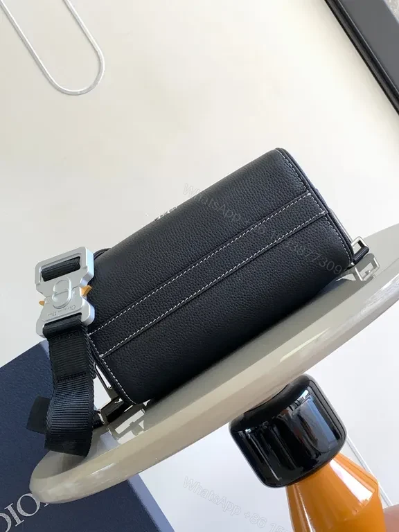 View 8 of Sleek Black Pebbled Leather Dior Crossbody Bag - Compact Couture