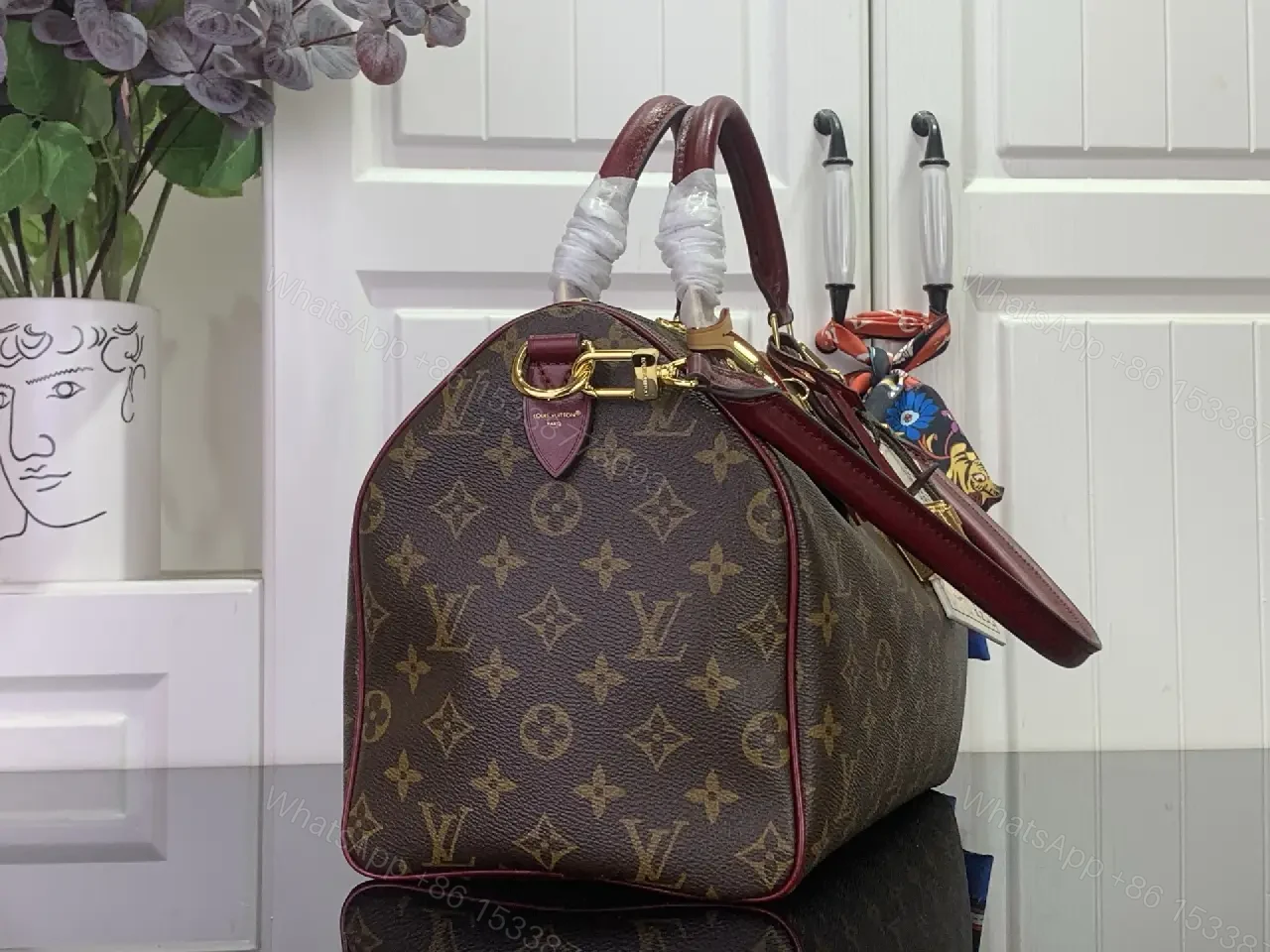 View 12 of Brown Canvas LV Monogram Travel Handbag with Burgundy Leather Trim