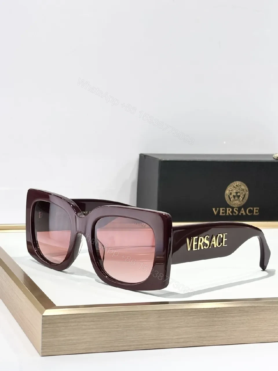 View 8 of Bold Black Statement Sunglasses with Logo-Injected Glamour