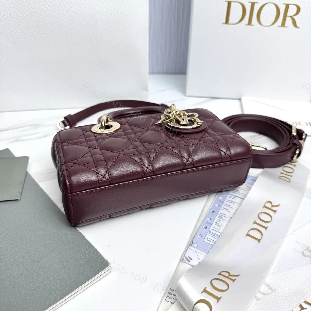 View 7 of Quilted Burgundy Calfskin Top-Handle Bag with Gold Accents