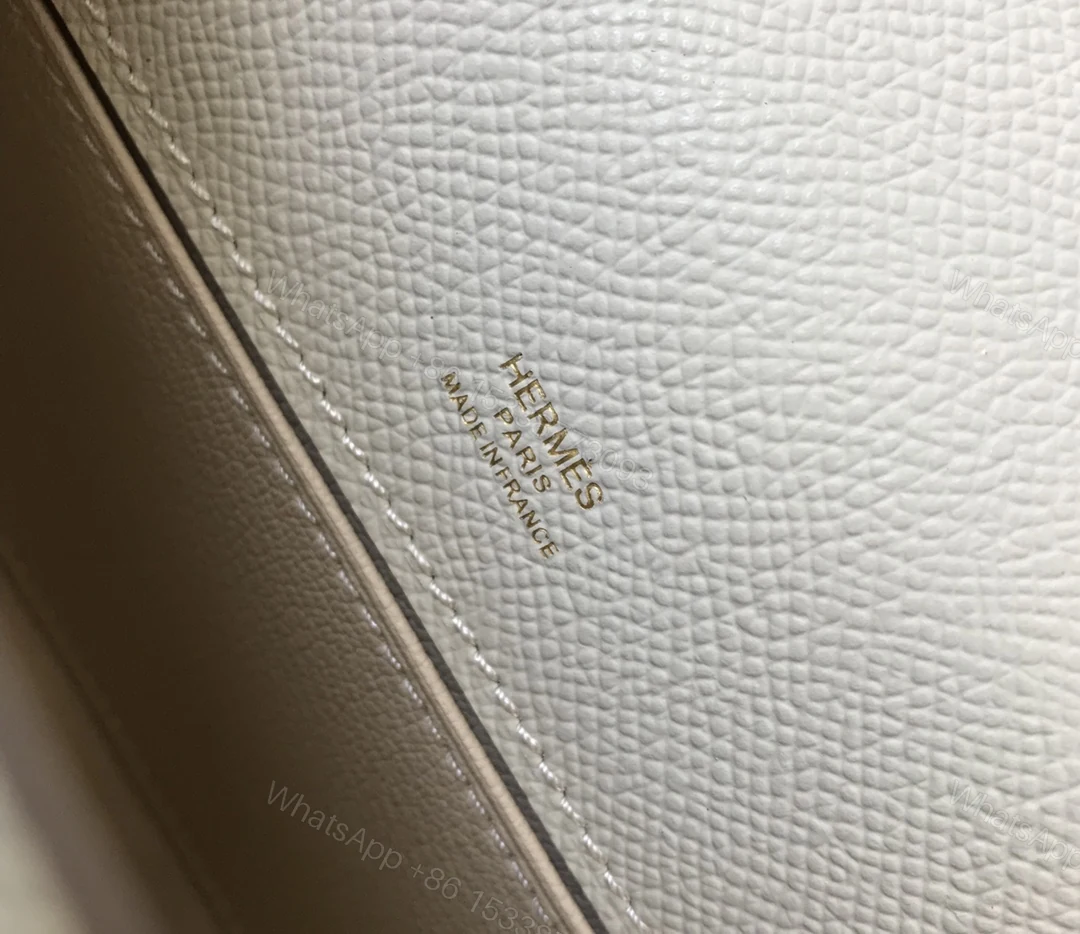 View 3 of HERMES MINI KELLY POCHETTE GOLD TONED HARDWARE WHITE 22CM