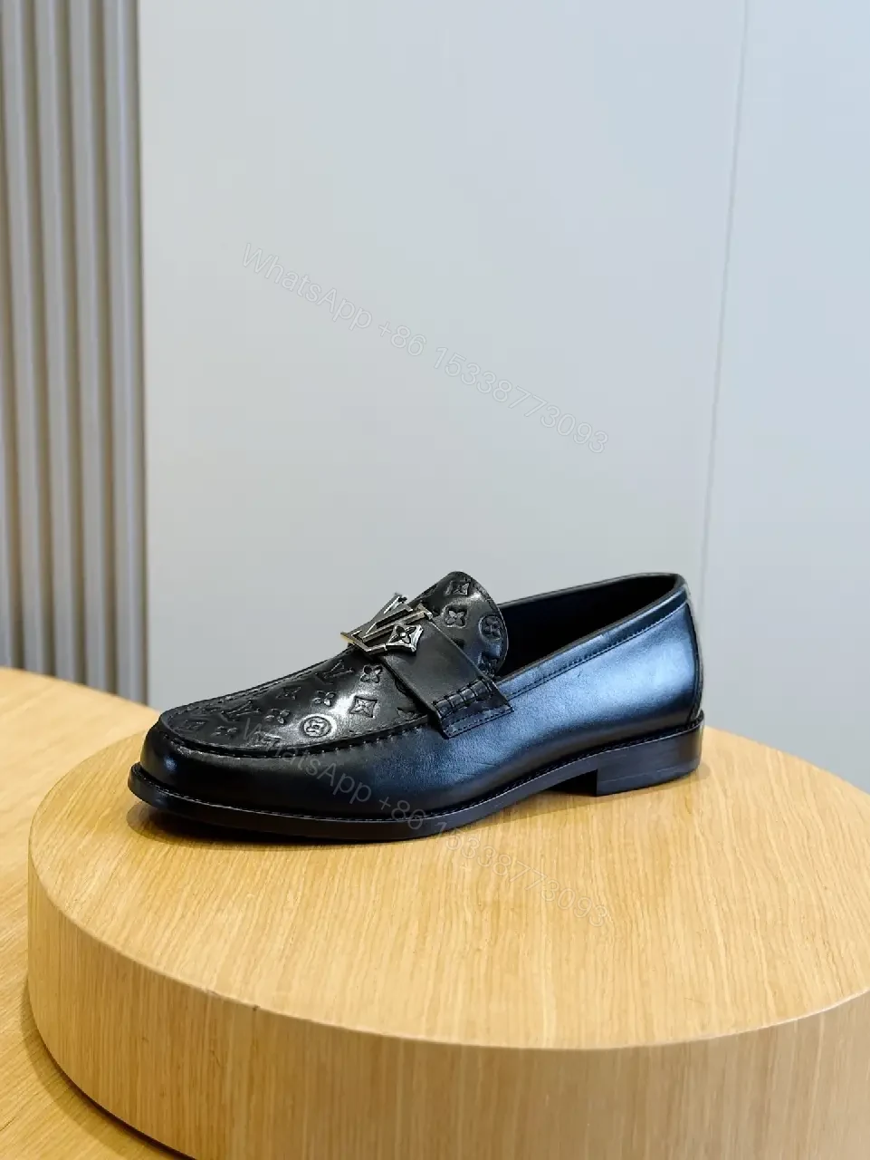 View 9 of Black Leather Monogram Penny Loafers Louis Vuitton Stylewith LV Logo