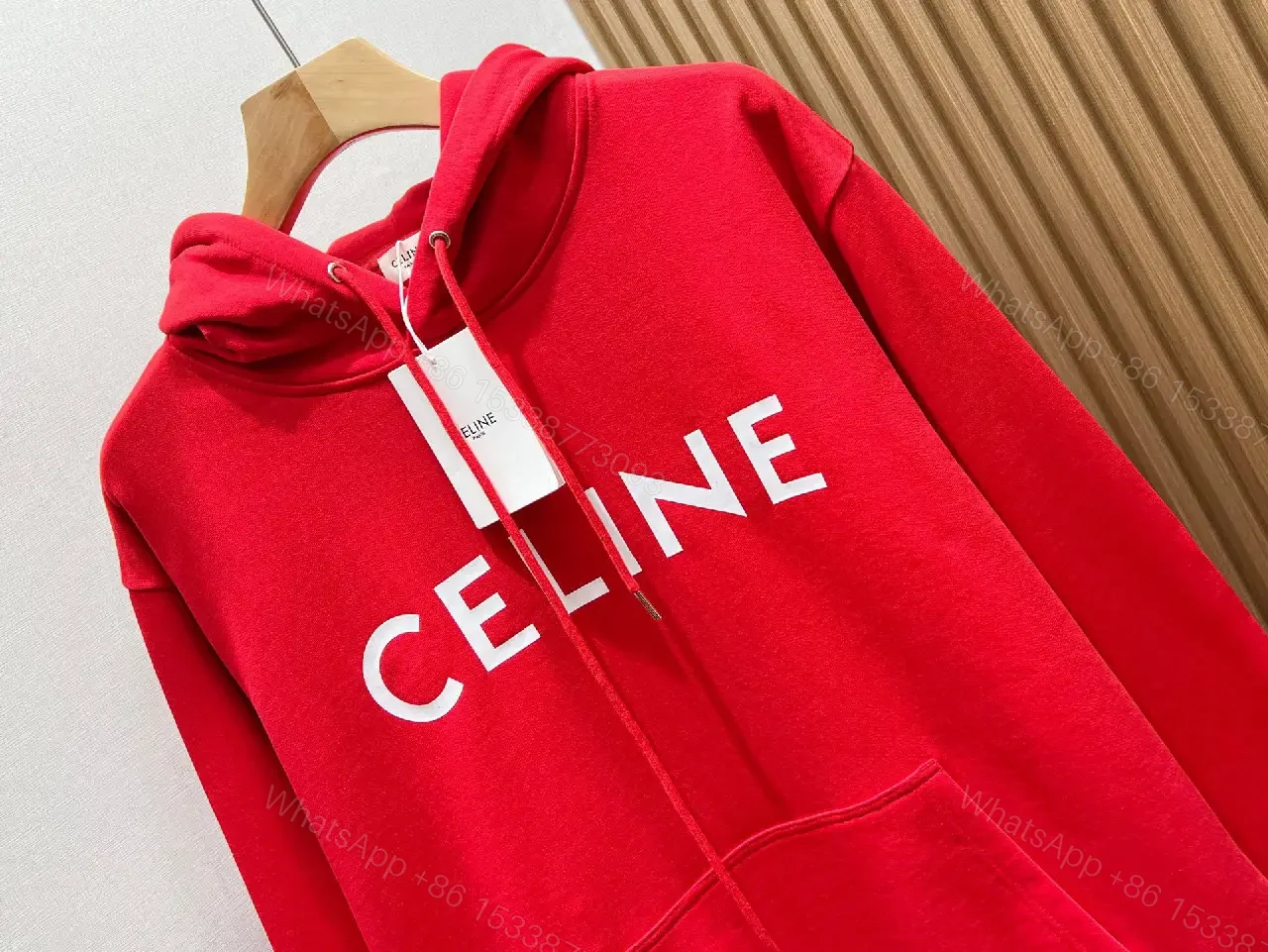 View 4 of Bold Red Hoodie with Celine-Inspired Typography