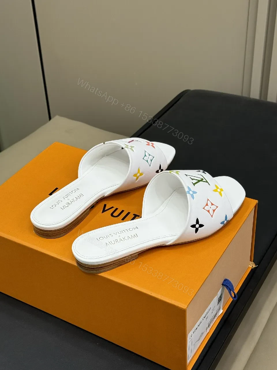 View 6 of White Leather Slides with Multicolor Monogram Detailing - Modern Luxury Comfort