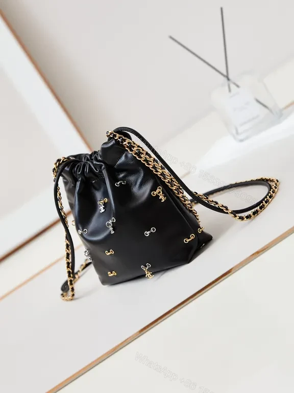 View 8 of Chanel-Inspired Mini Leather Drawstring Bag with Chain Detail