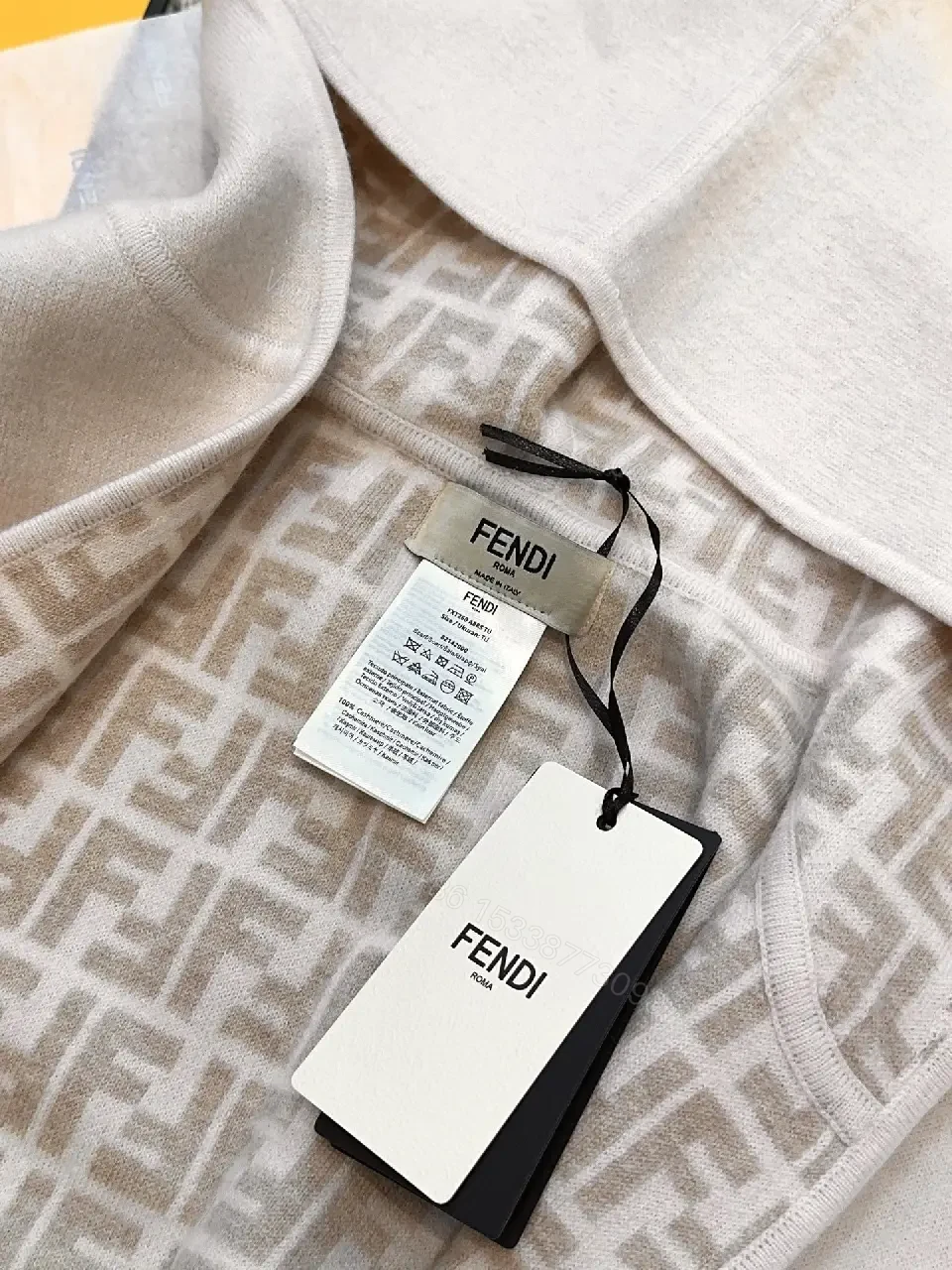 View 2 of Textured Cape Vest with Signature Trim Outerwear