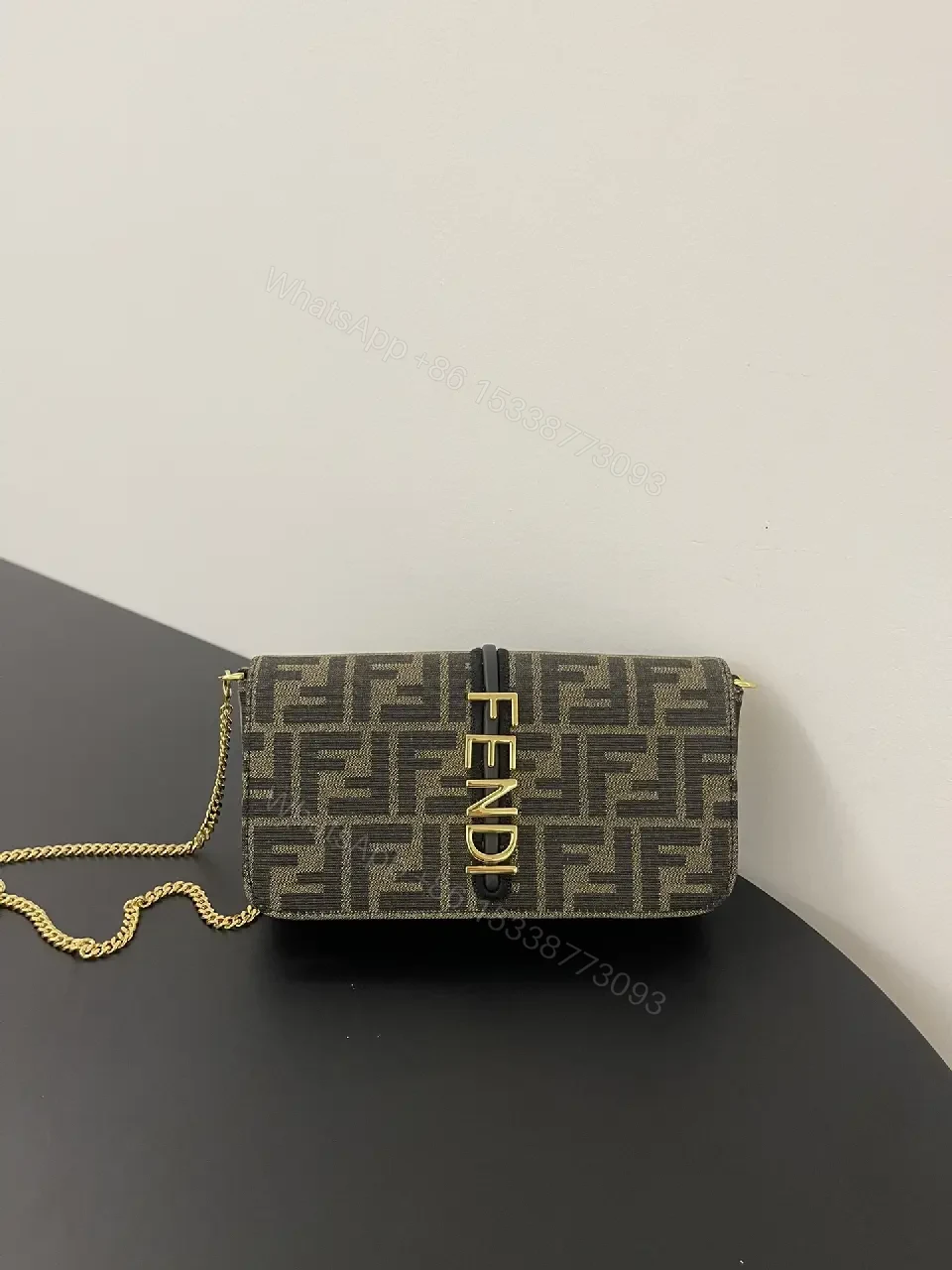 View 4 of Gray Coated Fabric Rectangular Shoulder Bag Bold Vertical Logo Clasp Product Type