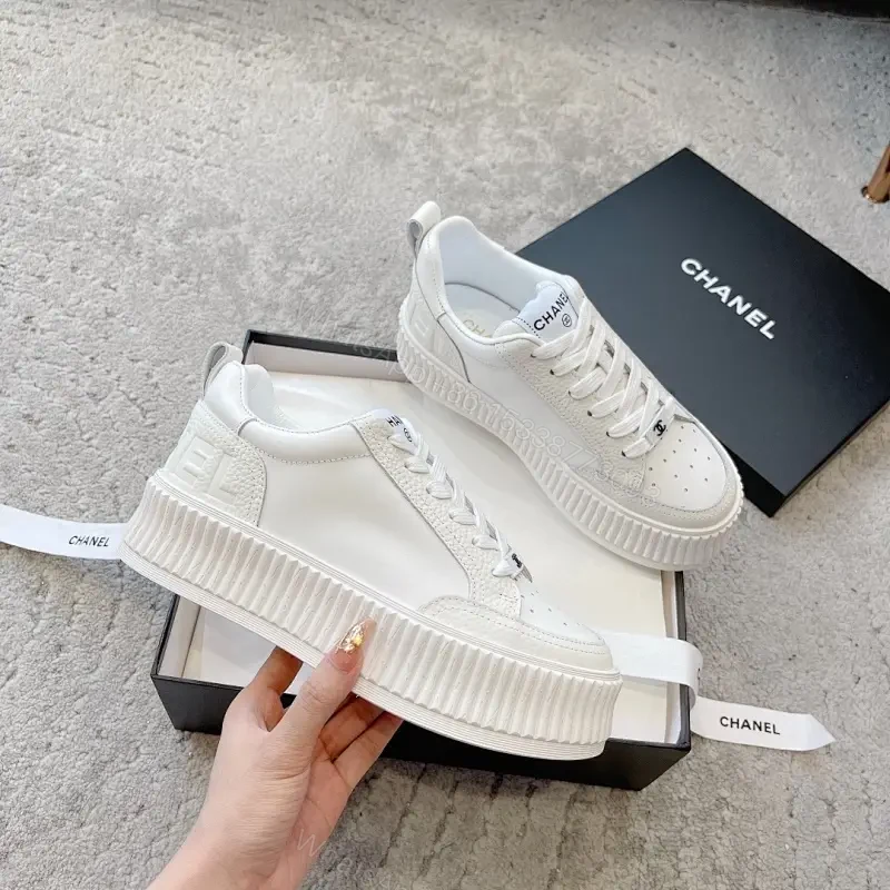 Minimalist White Platform Sneakers with Subtle Accents — view 1
