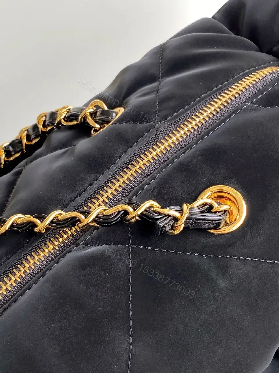 View 6 of Quilted Black Bag with Gold Chain - Compact Chic Signature