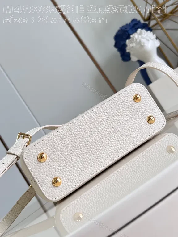 View 8 of Pristine White Pebbled Mini Bag with LV Hardware