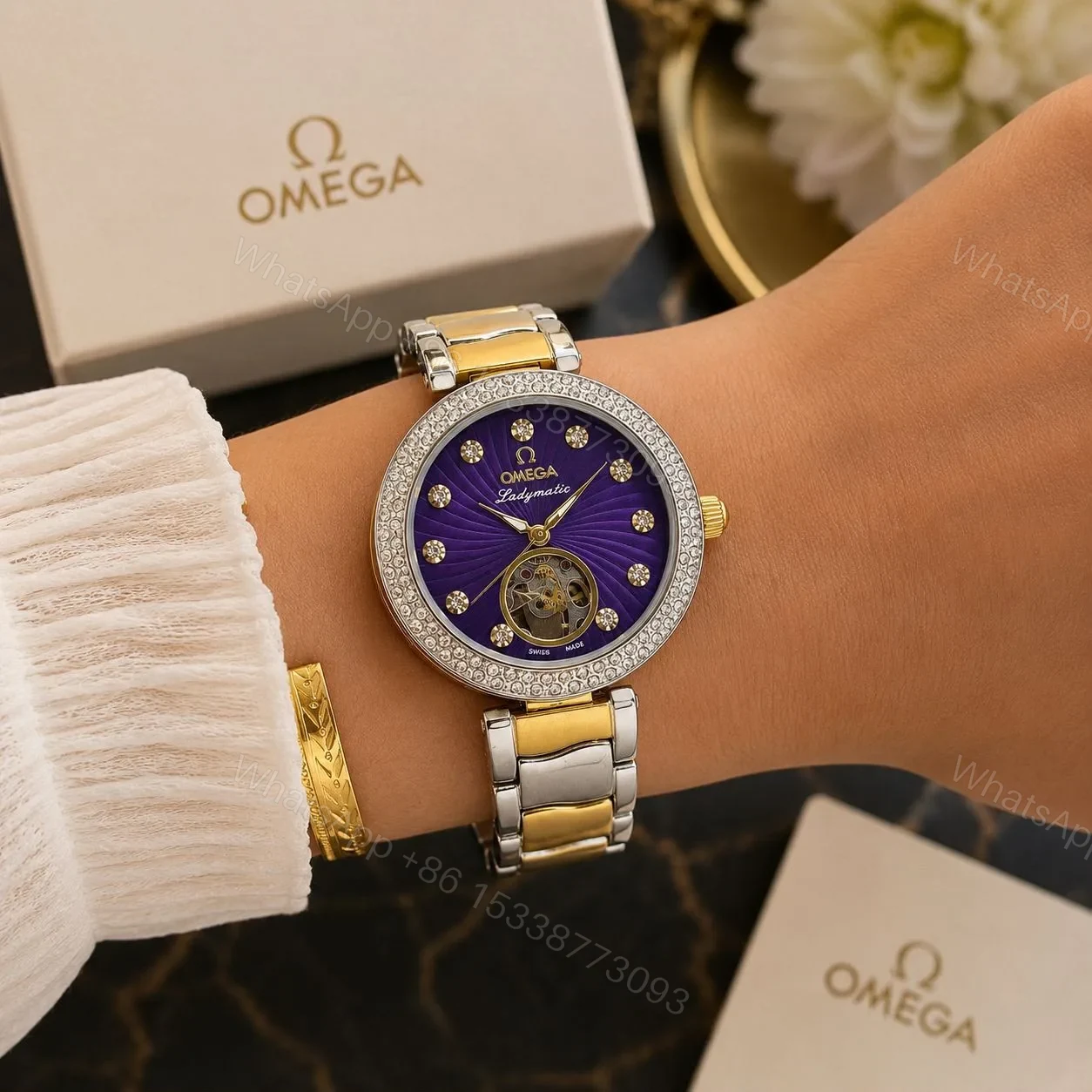 View 4 of Omega Ladymatic Purple Sunburst Dial