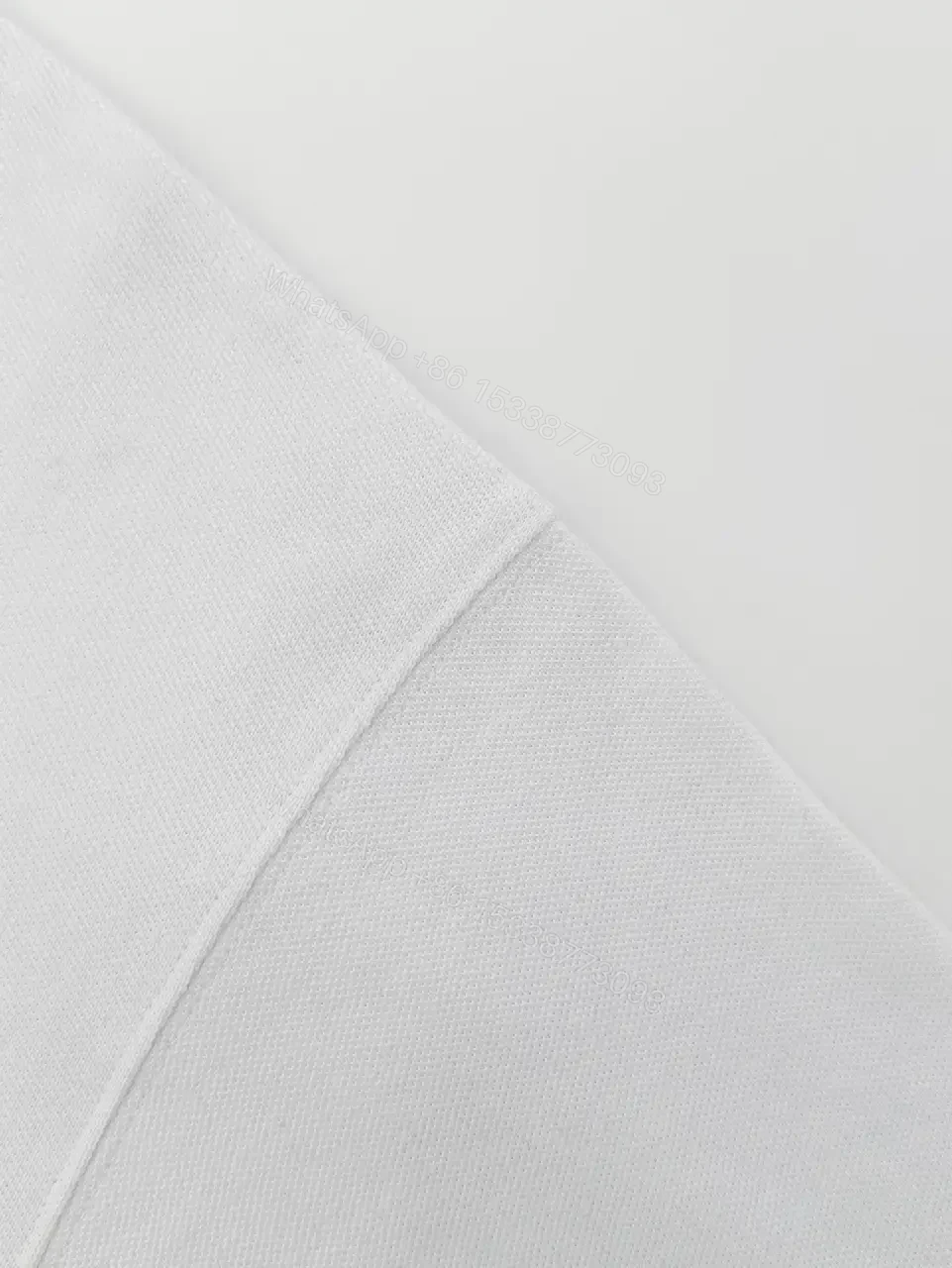 View 3 of Premium Cotton Tee: Minimalist White Crew Neck with Metallic Badge