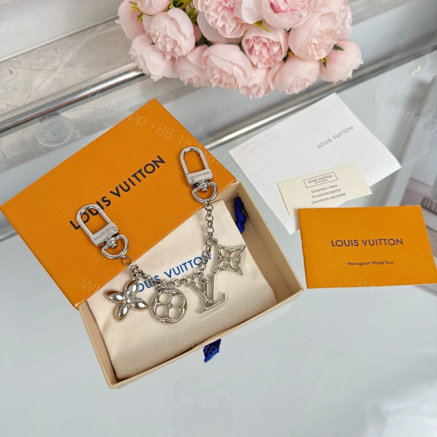 View 3 of Louis Vuitton Lv Logo Bag Charms