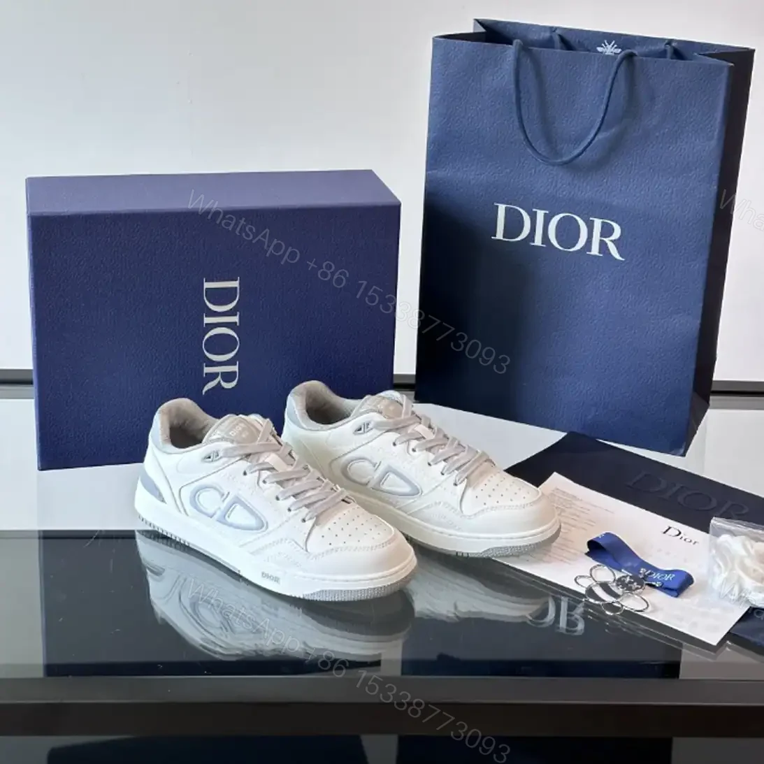 View 2 of DIOR B57 DRIBBLE SNEAKERS WHITE AND GRAY SMOOTH CALFSKIN WITH WHITE SUEDE – CD218
