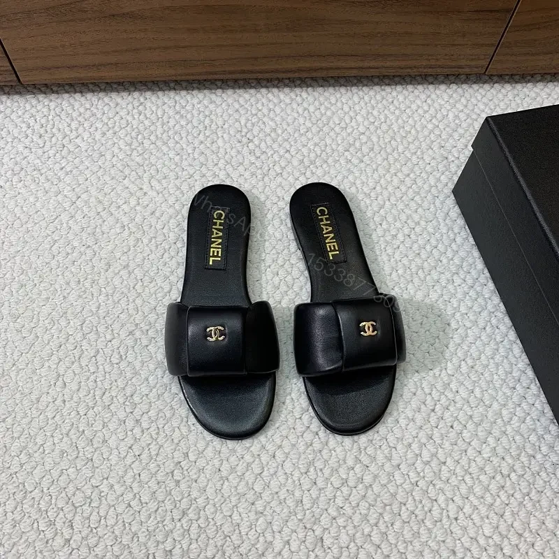 Black Leather Slide Gold CHANEL Logo Modern Comfort Fit Sandals — view 1