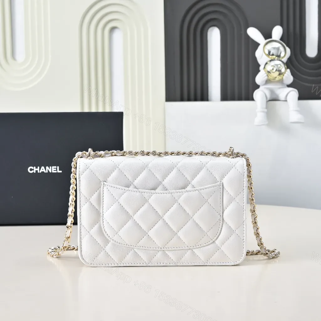 View 8 of Quilted Mini Bag: White Calfskin, Gold Chain, Luxe Silhouette