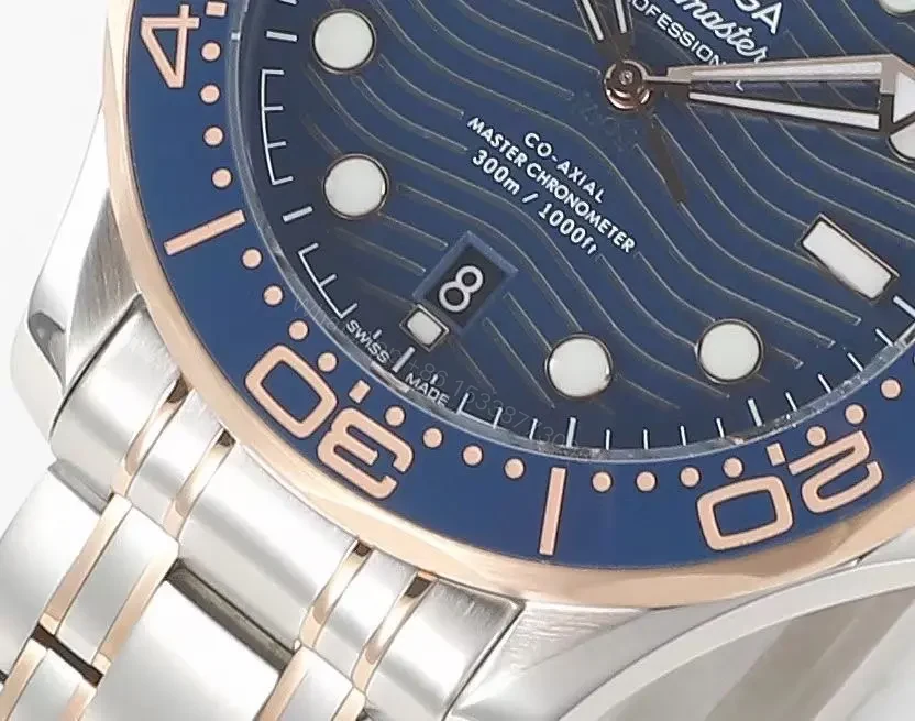 View 5 of Omega Seamaster Planet Ocean 300m Co-Axial Master Chronometer 42mm Diver’s Watch Stainless Steel with Rose Gold Accents Blue Ceramic Bezel and Blue Dial