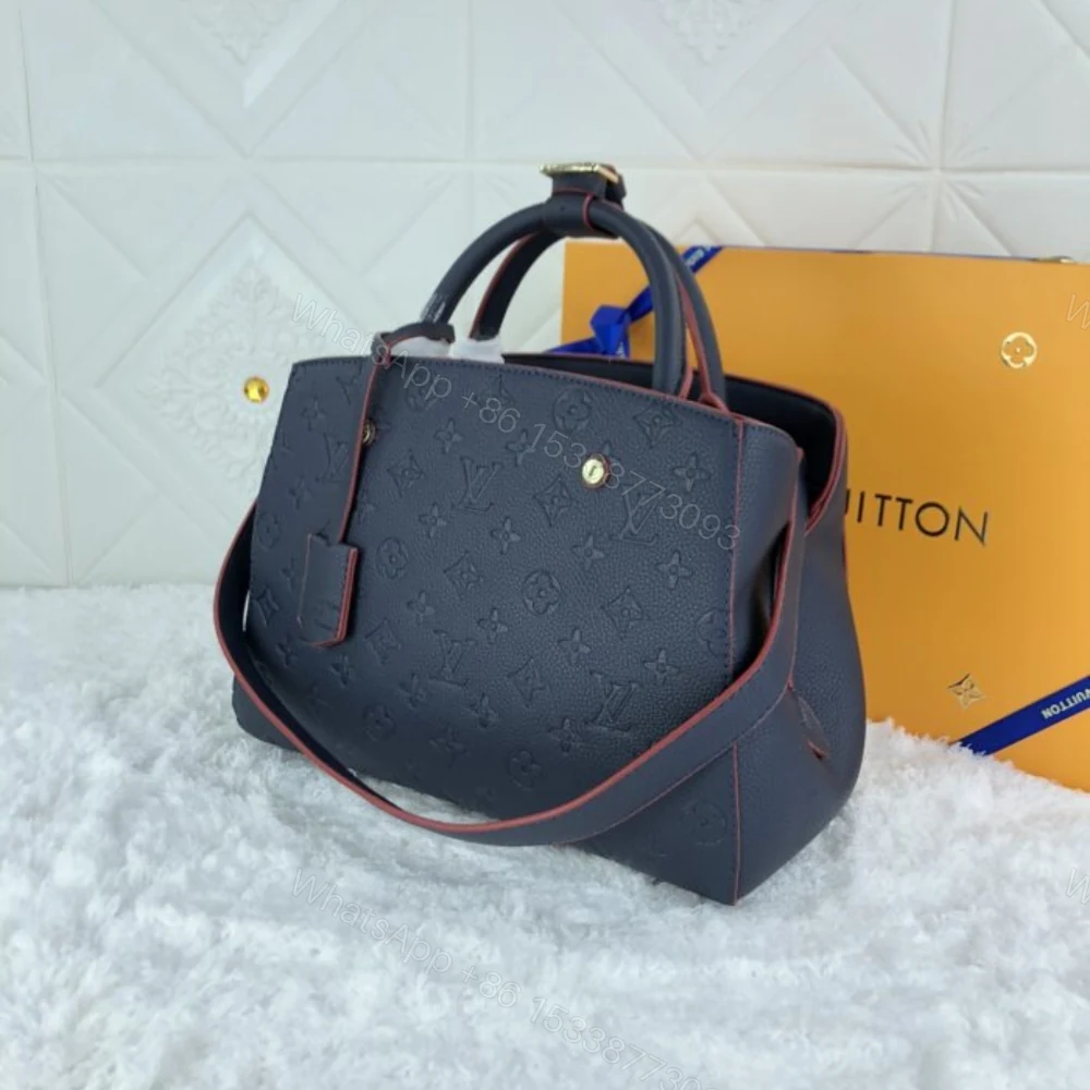 View 3 of Louis Vuitton Montaigne MM Monogram Empreinte Navy Blue 33Cm M42746