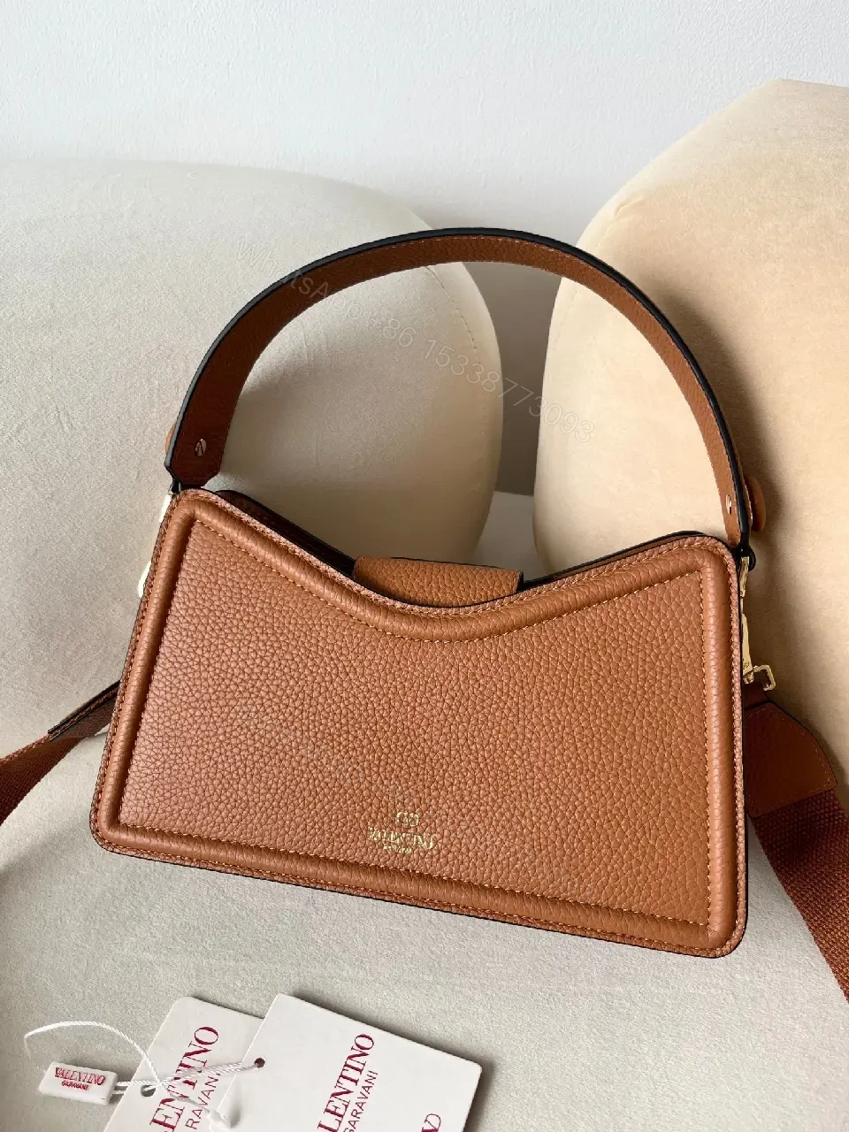 View 4 of Pebbled Leather Crossbody: Structured Chic, Everyday Luxury