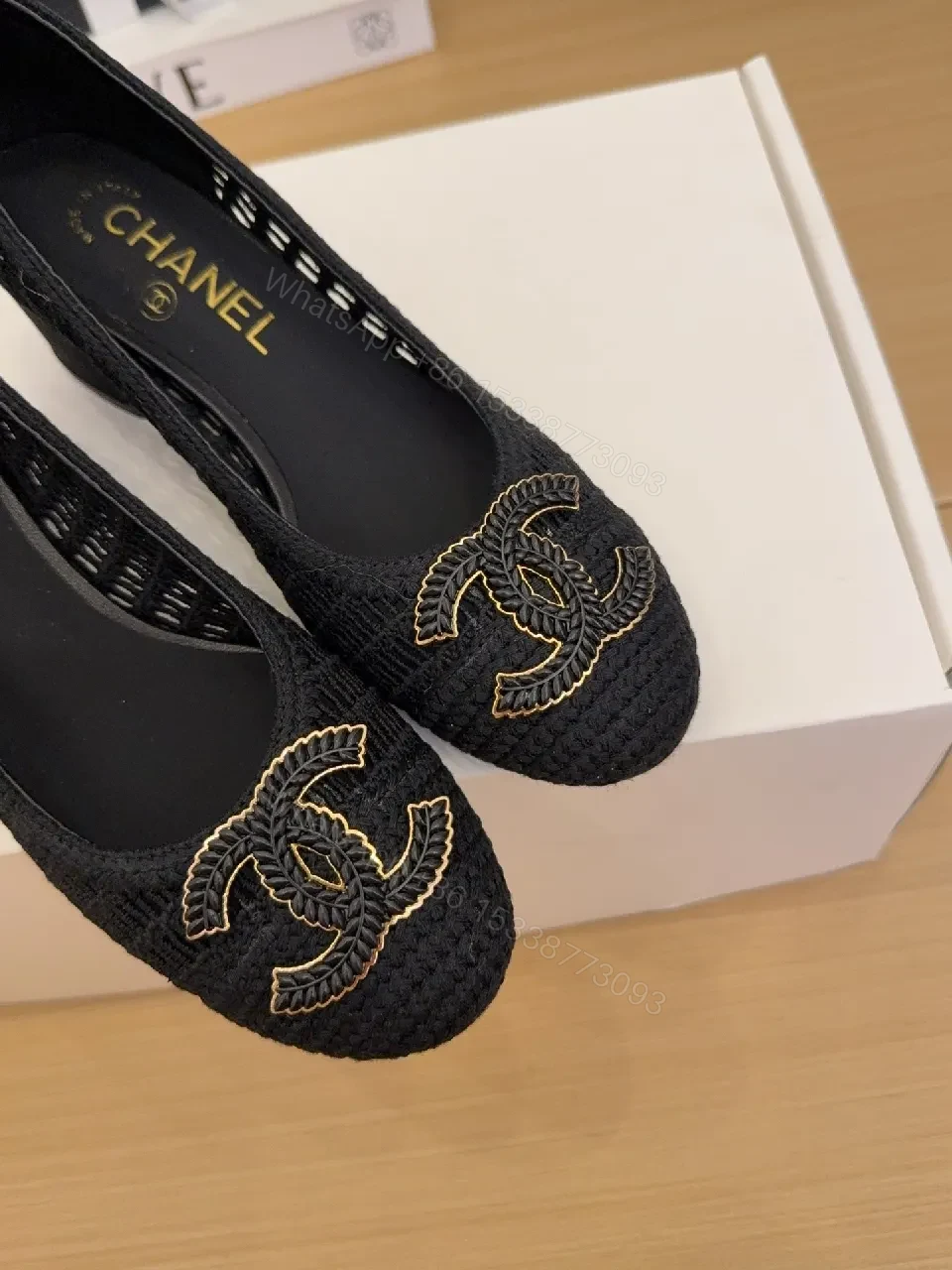 View 8 of Elegant Quilted Black Loafers with Gold Emblem: Everyday Luxury