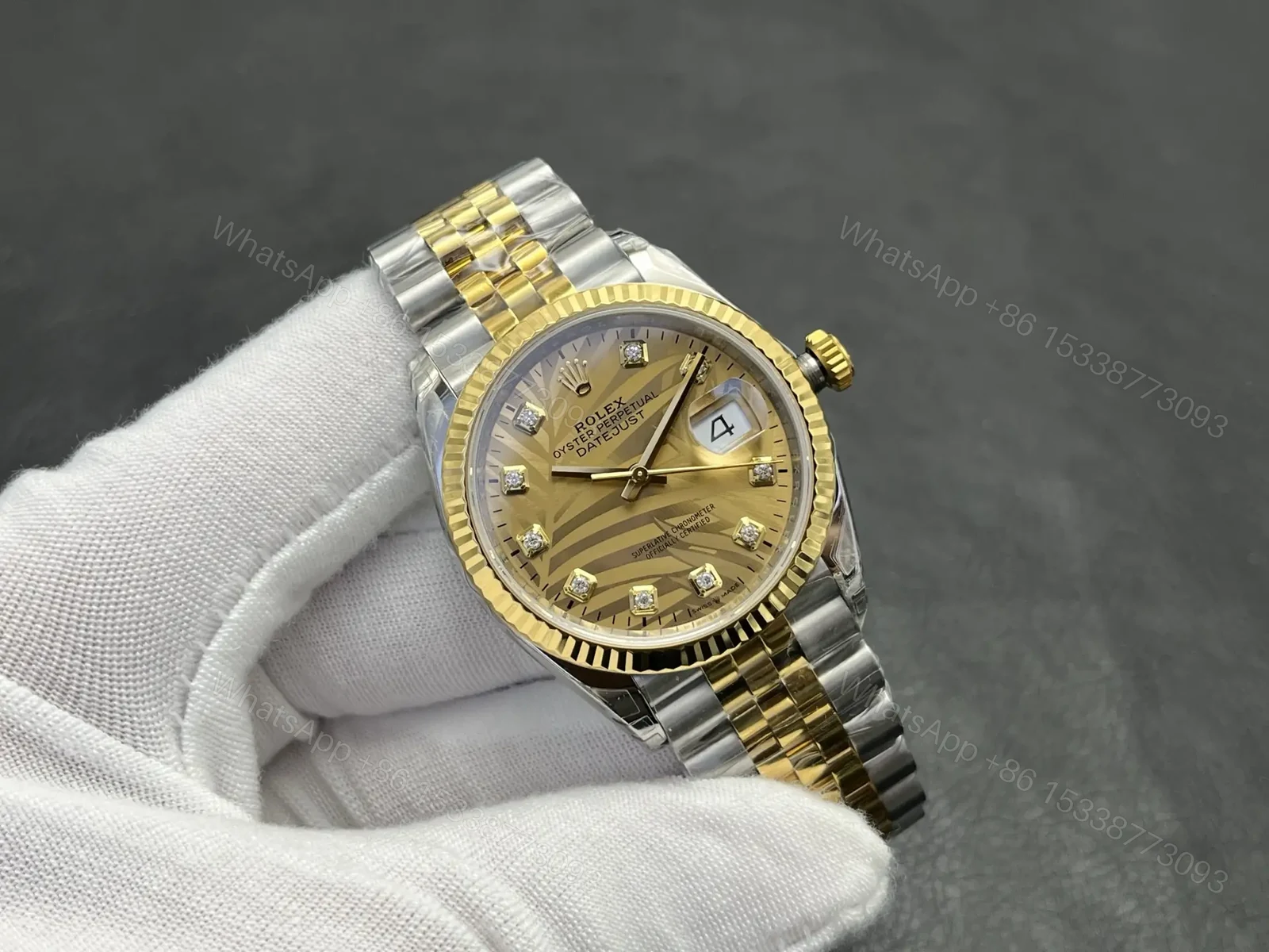 View 2 of Rolex Datejust 36 Stainless Steel Yellow Gold Fluted Champagne Palm Diamond Jubilee 126233-0043