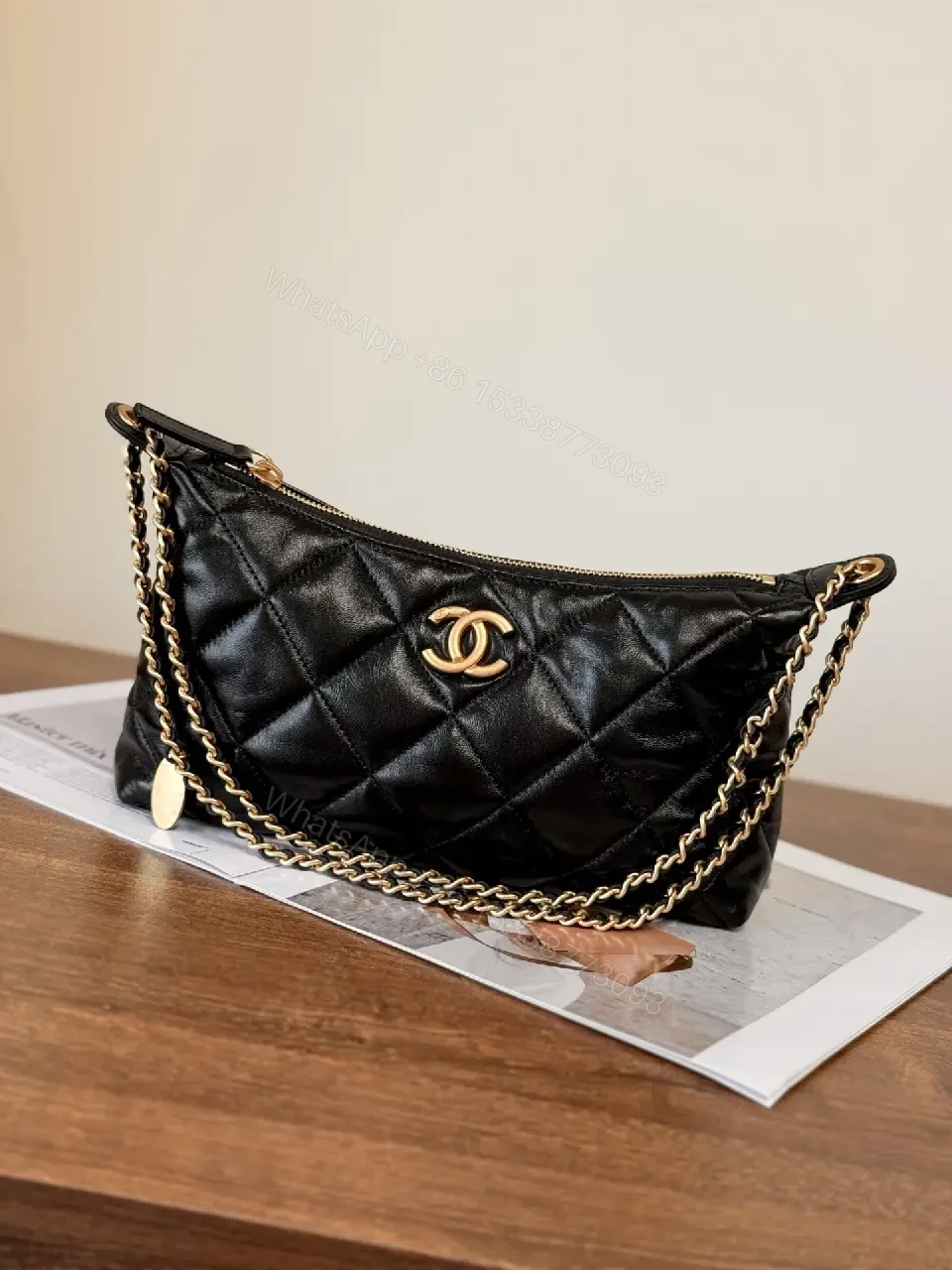 View 3 of Quilted Crossbody with Gold Emblem: Compact Luxury Bag