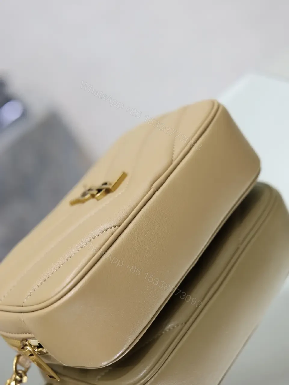 View 6 of Beige Leather Chevron Crossbody Bag with Gold YSL Logo