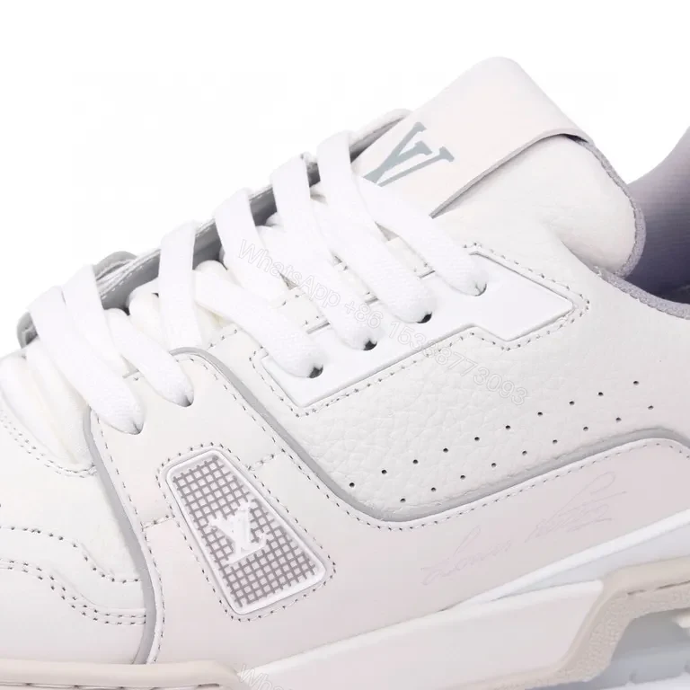 View 6 of Minimalist White Luxury Sneakers - Premium Leather, Subtle LV Details, All-Day Comfort