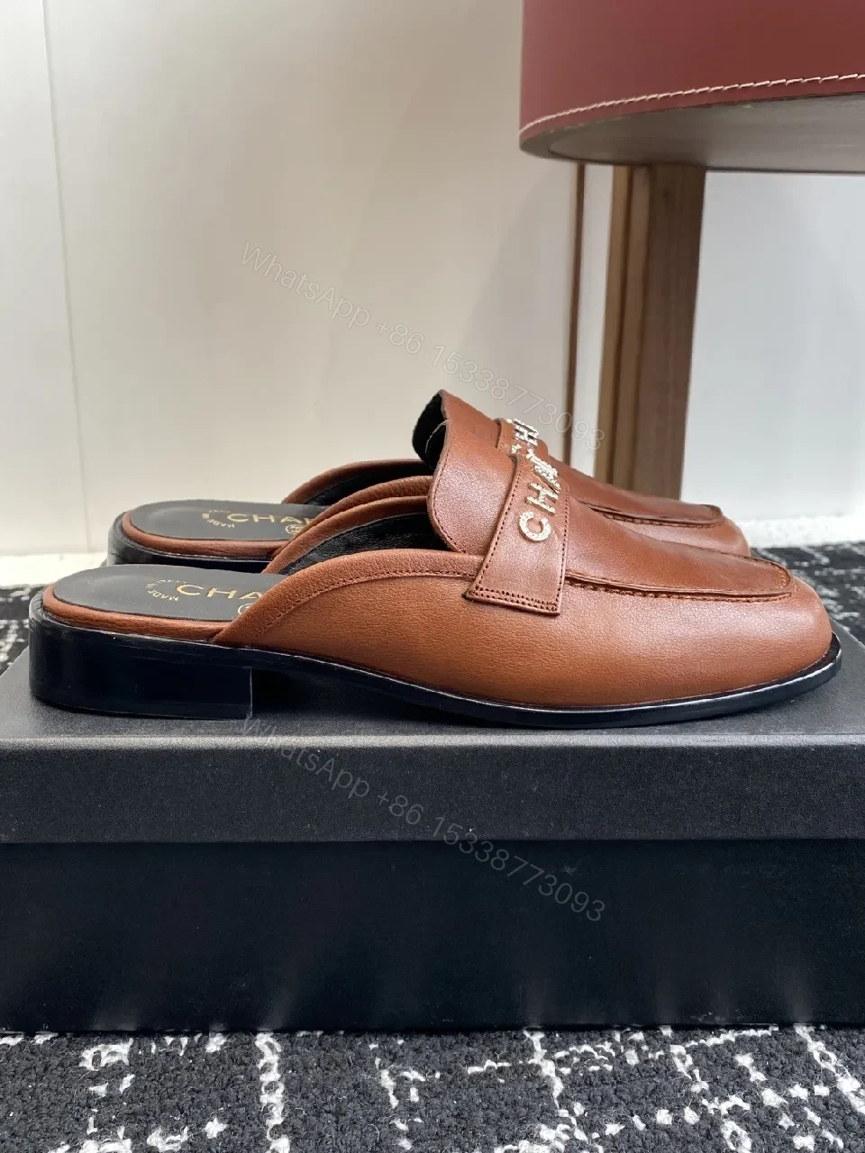 View 5 of Caramel Leather Mules with Bold Logo – Luxury Comfort Slips