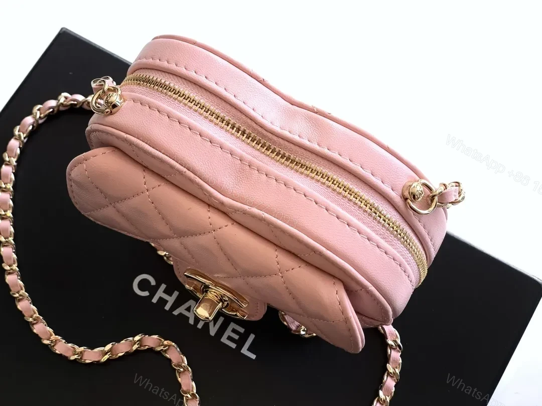 View 9 of Soft Pink Quilted Heart Mini Bag with Gold Logo Bag