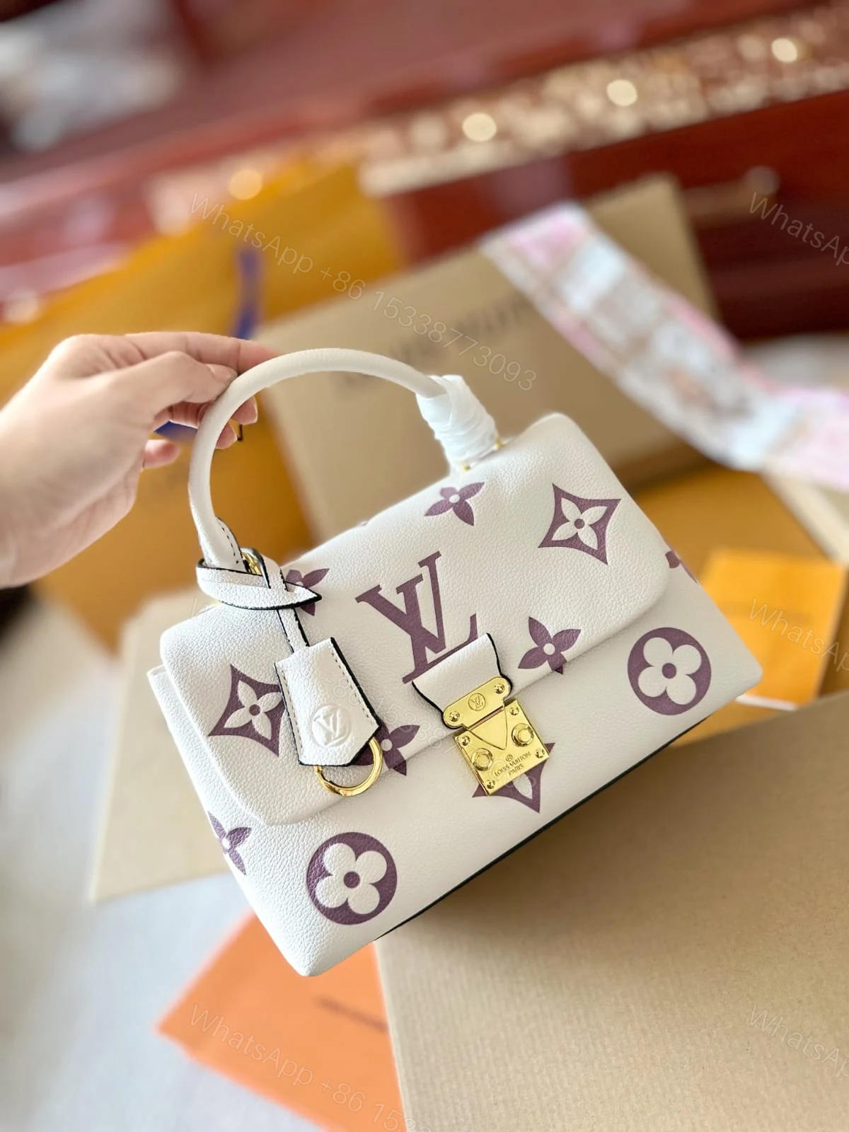 View 7 of FIRST COPY LOUIS VUITTON MADELEINE MM BICOLOR HANDBAG
