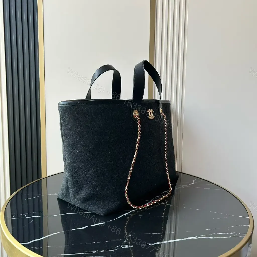 View 6 of Chic Black Quilted Tote with Gold Hardware - Luxury Everyday tote