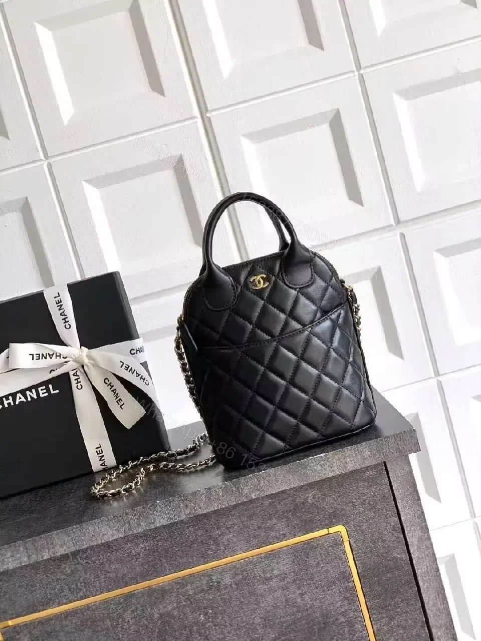 Mini Quilted Black Bag with Gold Logo—Refined Daily Companion — view 1