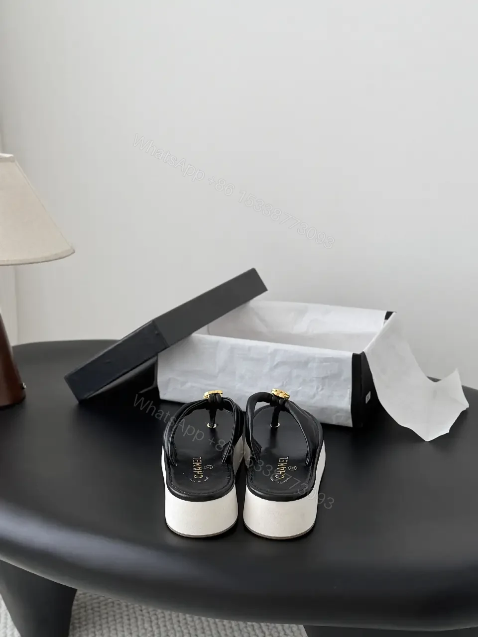 View 2 of Black Leather Slide Sandals with Gold Chanel Logo