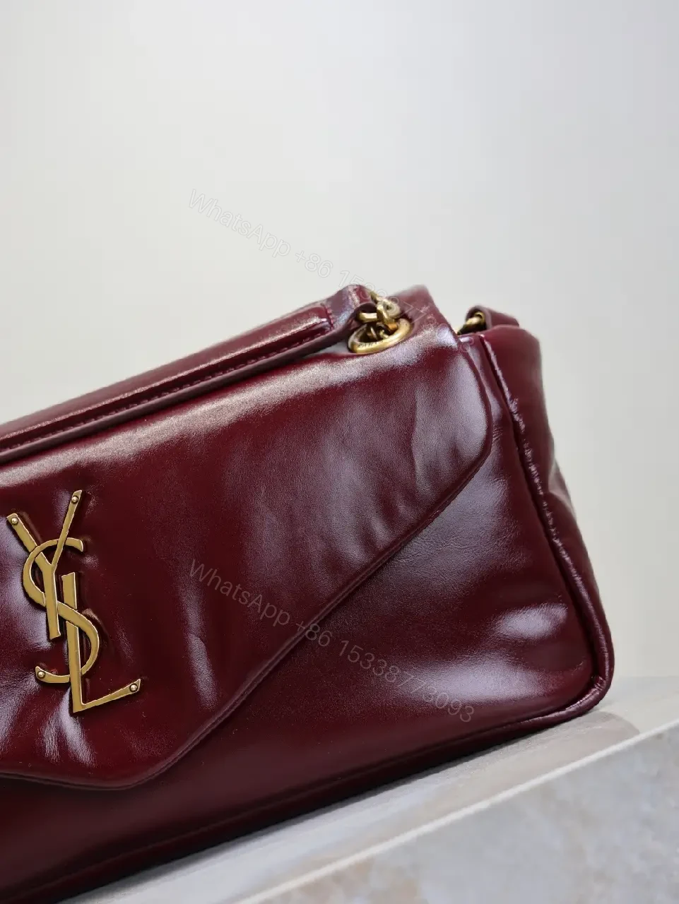 View 5 of Burgundy Calfskin Compact Shoulder Bag with Gold Hardware