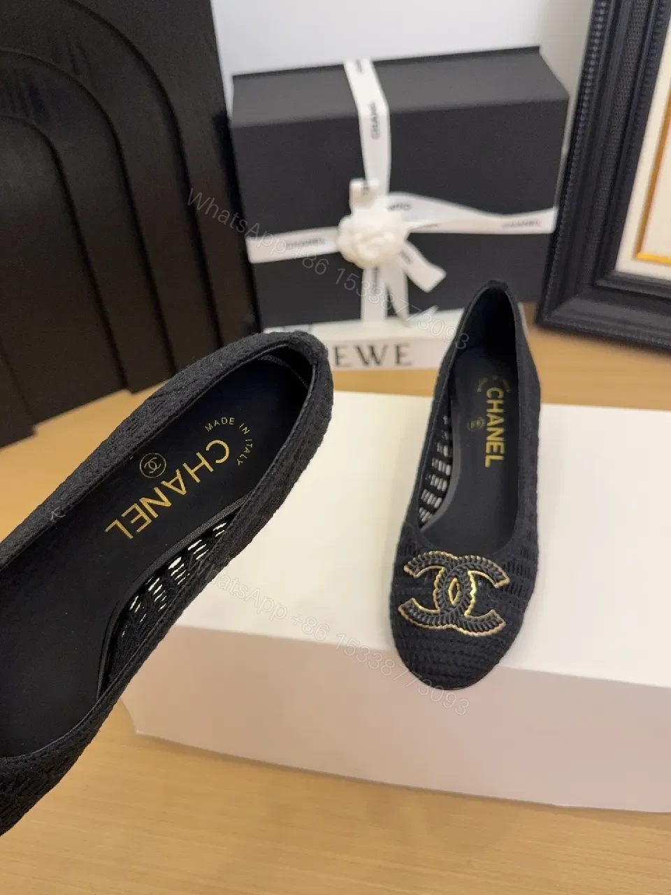 View 2 of Elegant Quilted Black Loafers with Gold Emblem: Everyday Luxury