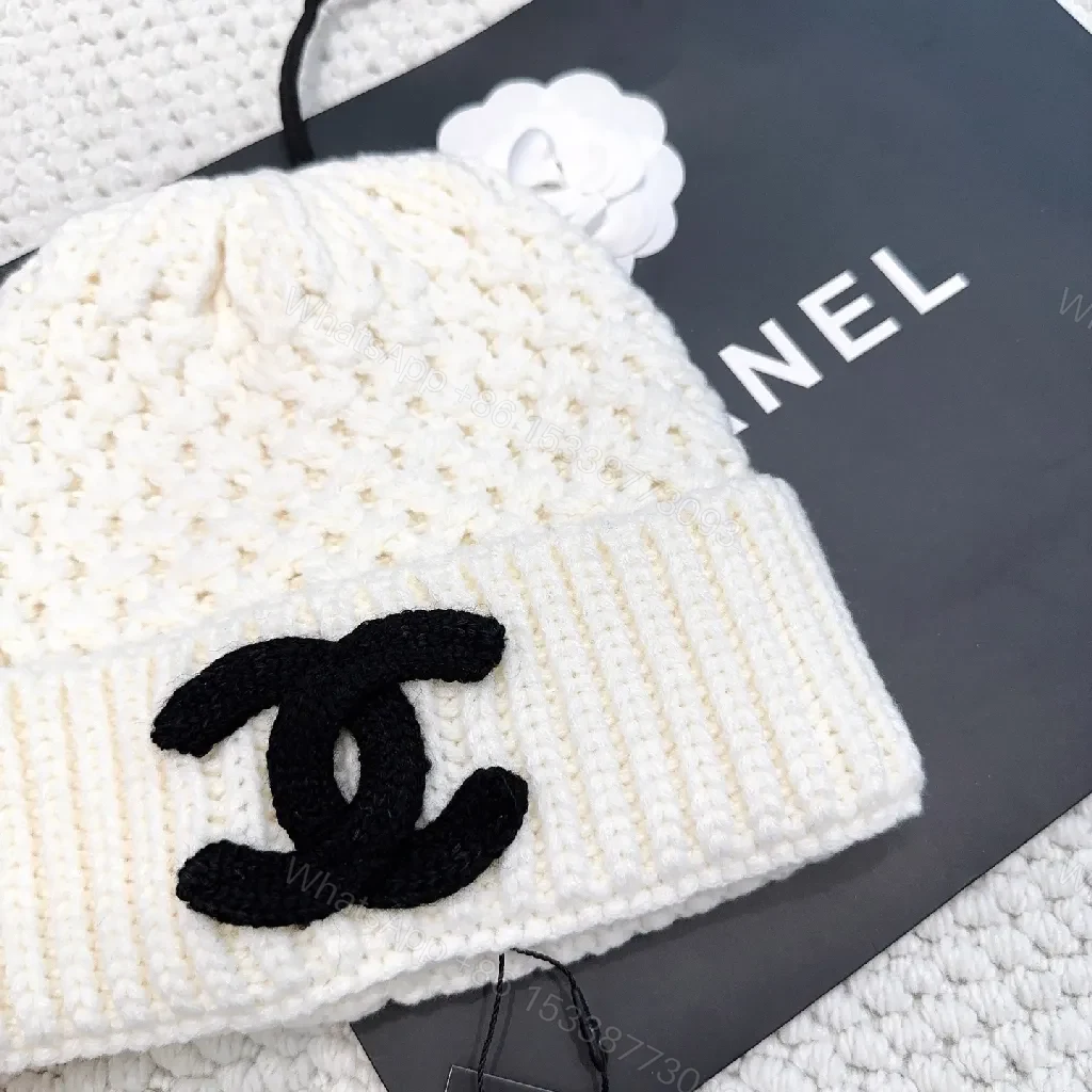View 5 of Knit Beanie: Luxe Texture, Signature Emblem, Couture-Inspired