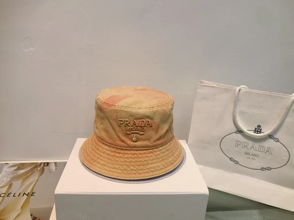 View 6 of Chic Buckle-Textured Pink Palette Bucket Hat - Prada Logo