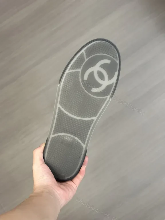 View 4 of Monochrome Chanel-Style Low-Top Sneakers with Signature Emblem