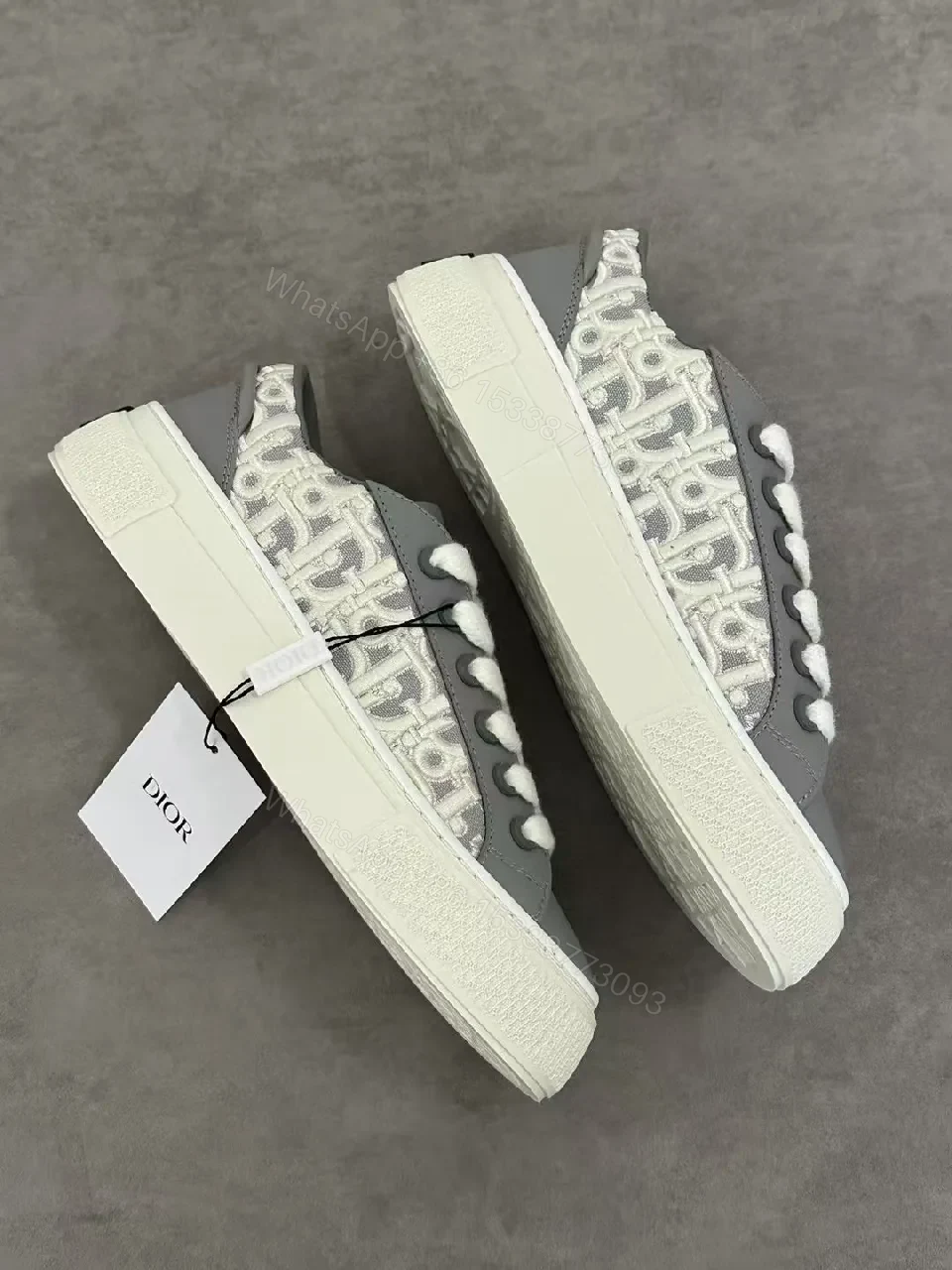 View 6 of Gray Leather Sneaker with Monogram Pattern, Luxurious Texture, Casual High-Tops