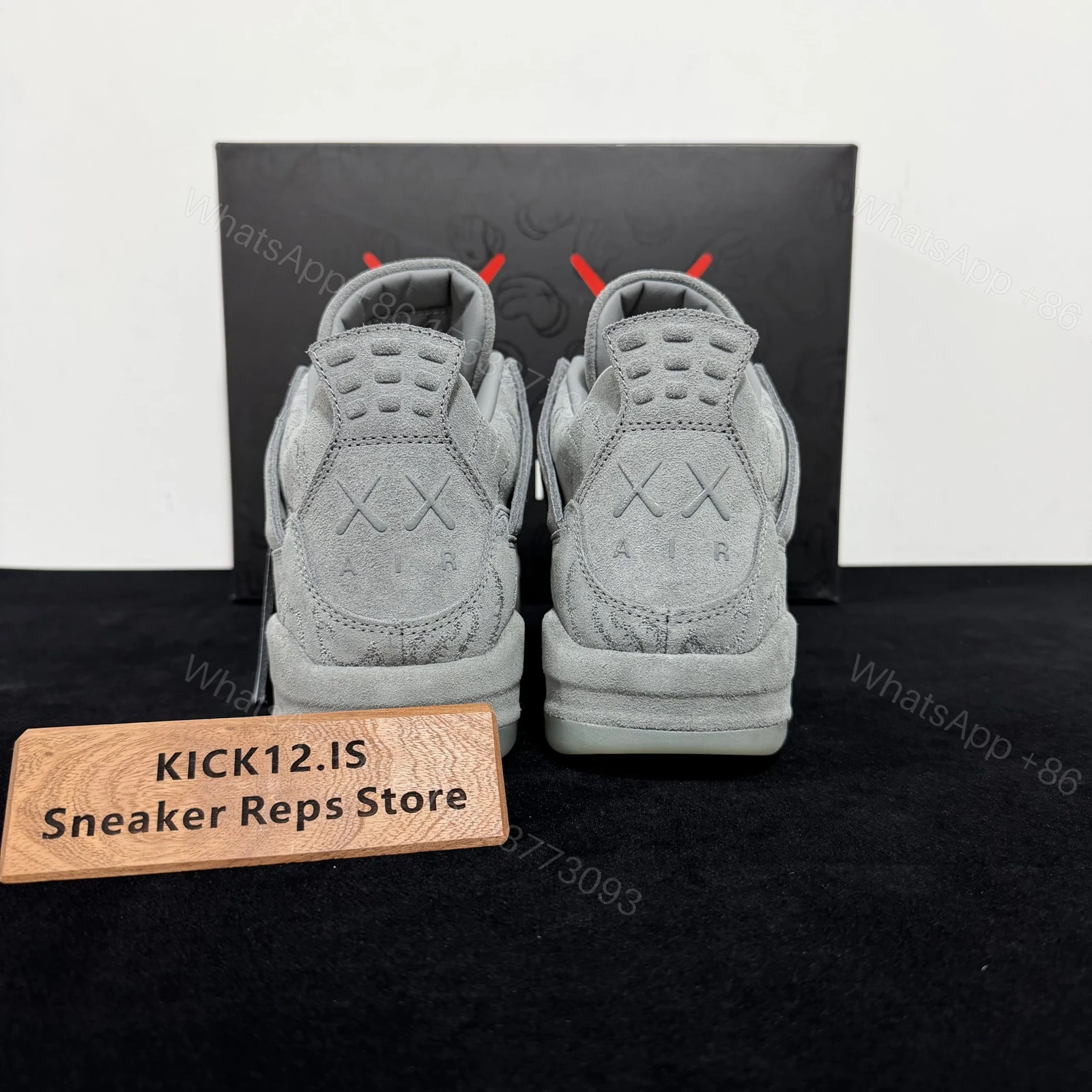 View 6 of Air Jordan 4 Retro KAWS Grey Reps