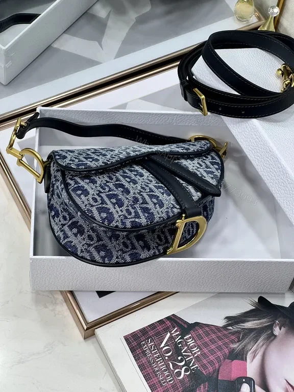 View 9 of Chic Denim Saddle Bag - Luxe Gold Hardware, Everyday Distinction