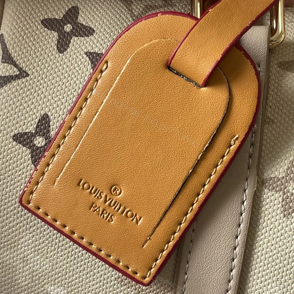 View 5 of Louis Vuitton Keepall Bandoulière 25 Sand Beige 25Cm M29272