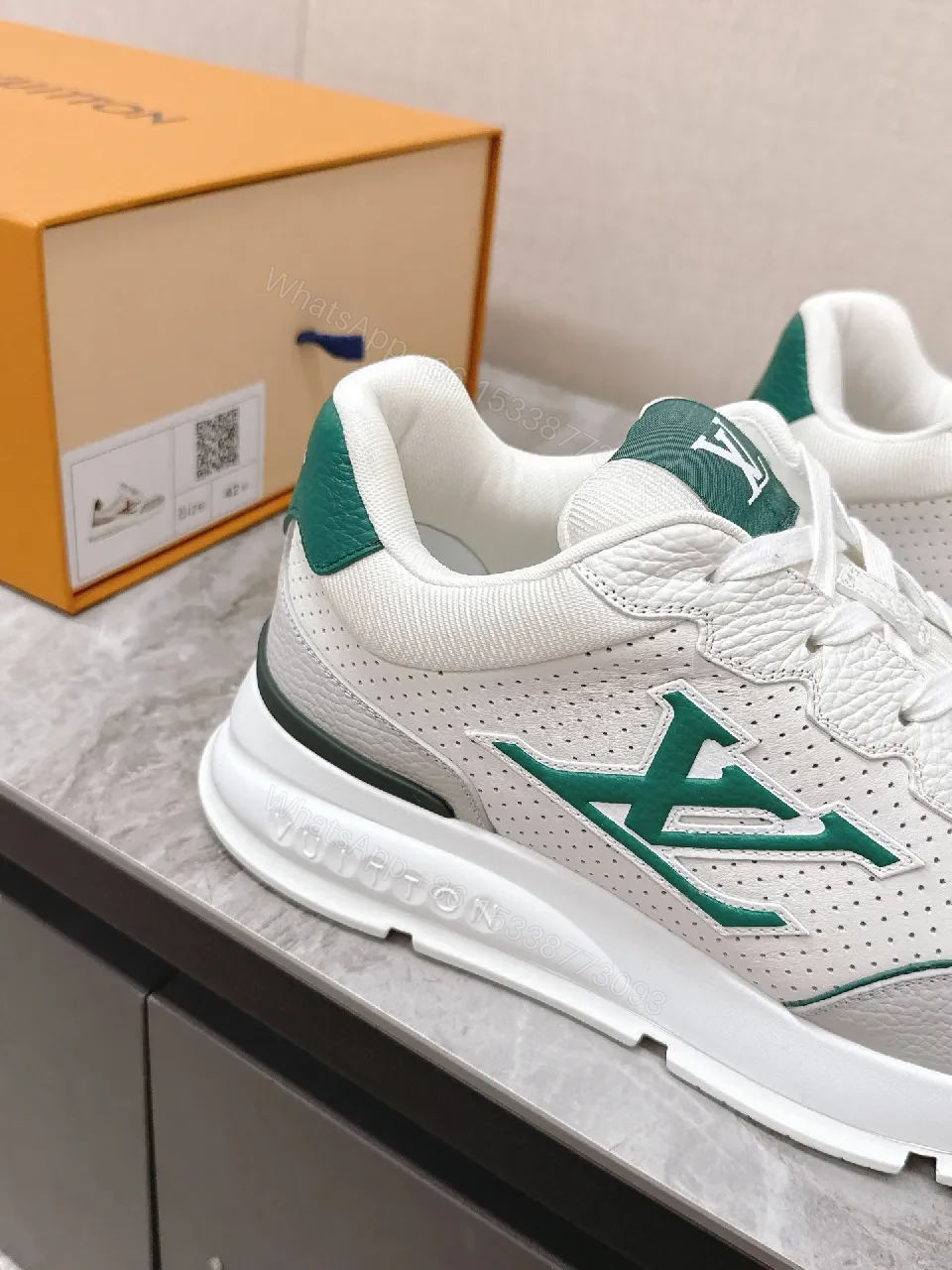 View 2 of White Leather Sneaker with Green Accents: Modern Luxury Comfort