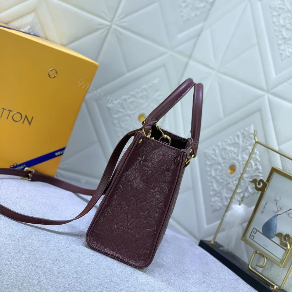 View 3 of Louis Vuitton Onthego MM Monogram Empreinte Wine Red 35Cm M46601