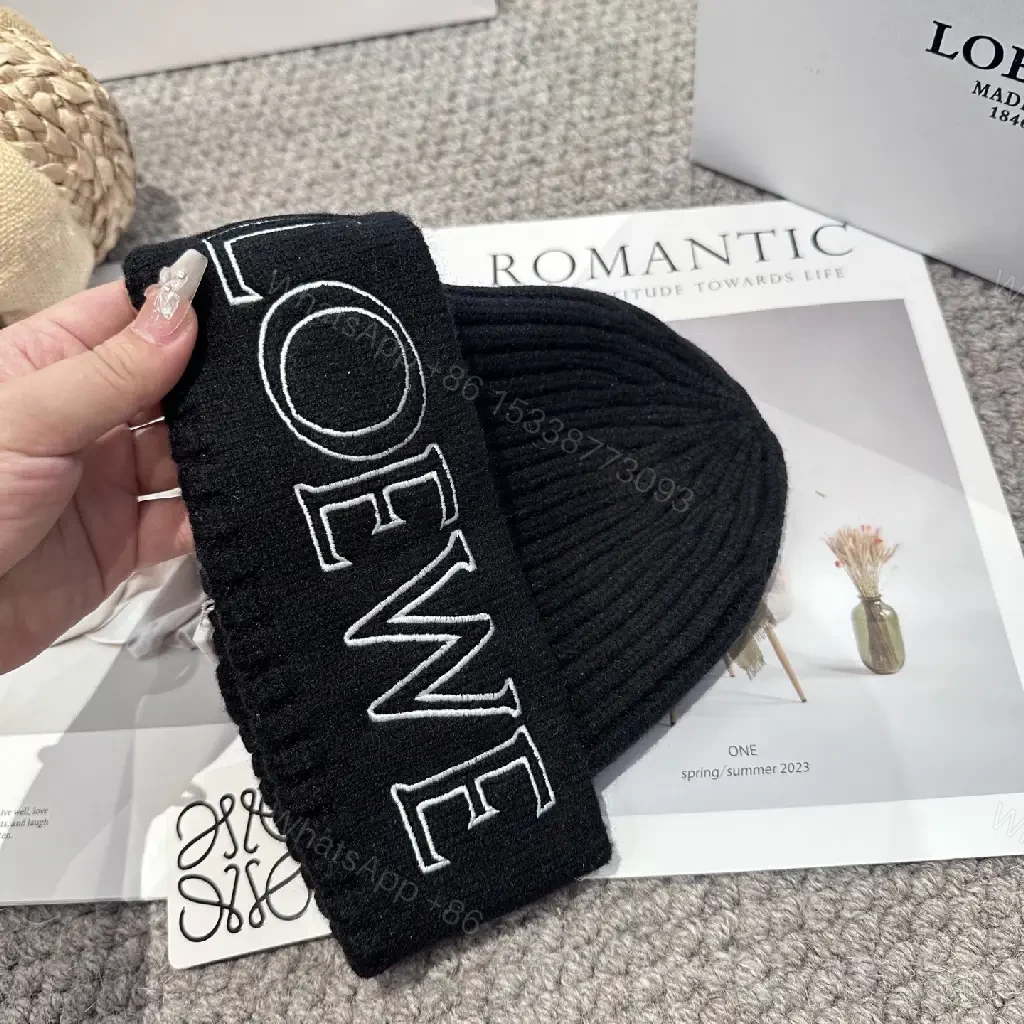 View 3 of Black Knit Beanie + Premium Knit + Chic Minimalist + LOEWE Logo Statement + Beanie