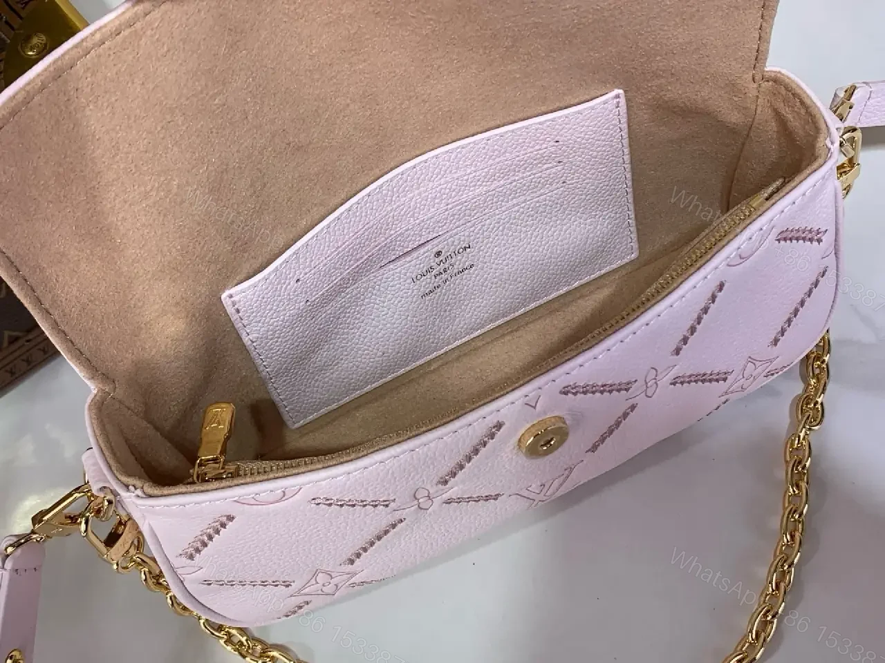 View 2 of Light Pink Pebbled Leather Shoulder Bag with LV Monogram Pattern