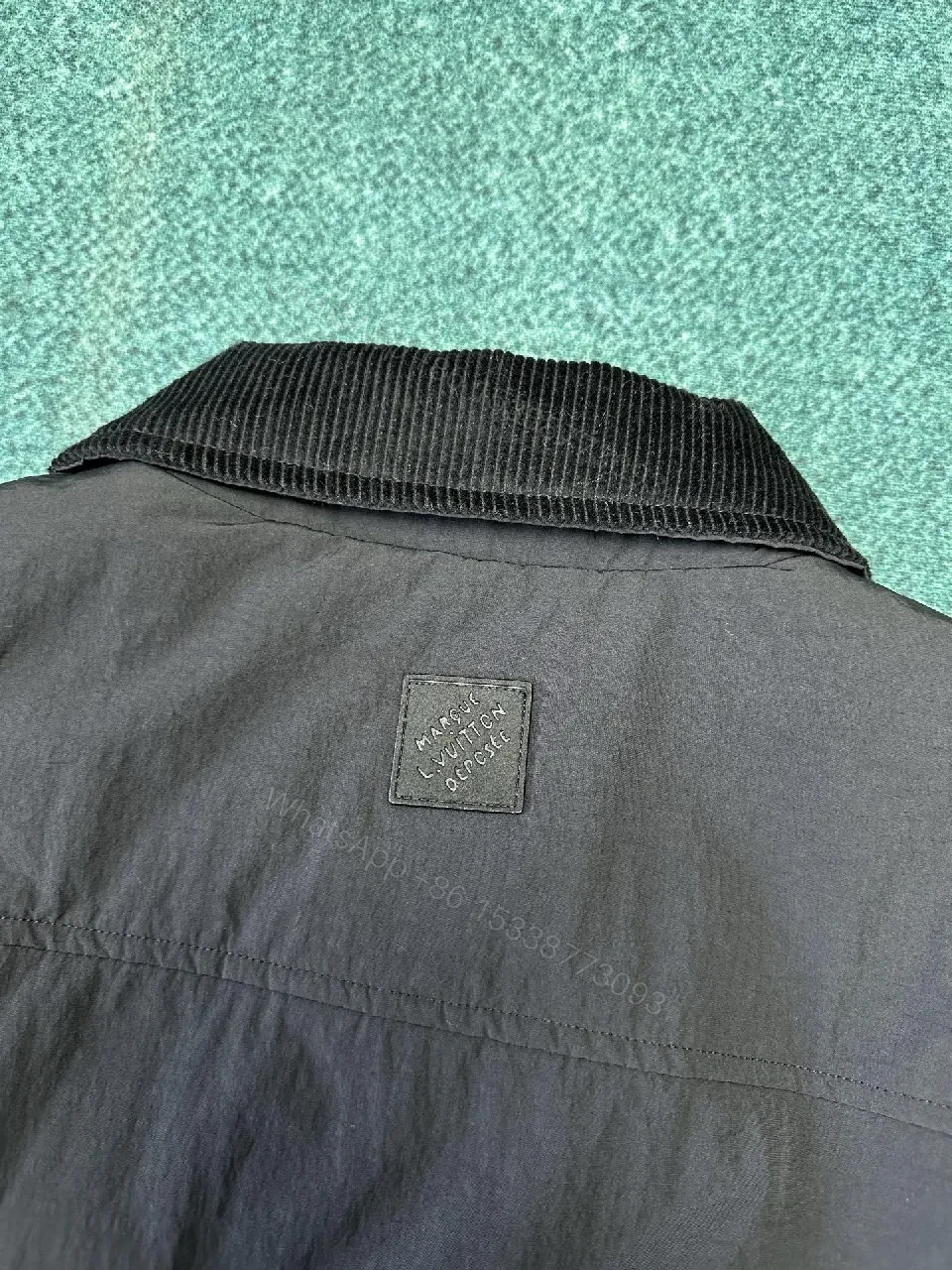 View 6 of Dark Matte Jacket with Signature LV Stitch Pocket - Modern Minimalist Jacket